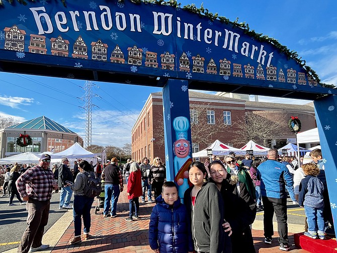 The WinterMarkt 2023 is the first time the Fuentes family, Jacob, 5, Doris, and Ashlyn, 11, attended the event.