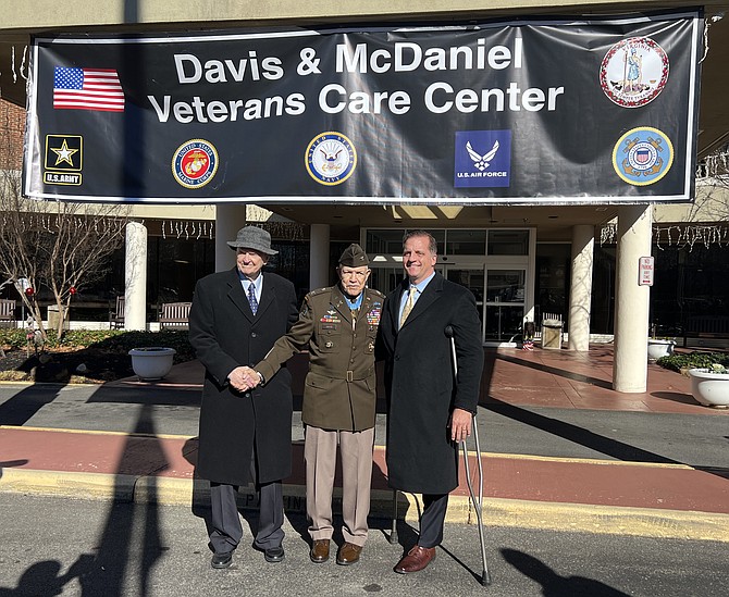 Commissioner Daniel Gade, center, poses with fellow Alexandria residents Capt. Eugene “Red” McDaniel and Col. Paris Davis Dec. 12 in Roanoke.