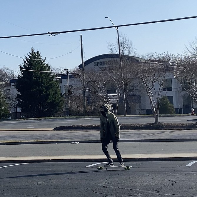 The skateboard rider in question flies along on the Mount Vernon roads with no fear.