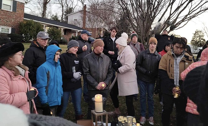 Huntsman neighborhood holds a candlelight vigil in support of the Wong family