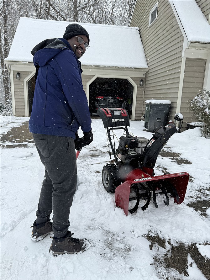 Neighbors, like Wilson Muscadin, of Springfield, broke out shovels and blowers to uncover area sidewalks and driveways after the area saw 3 to 5 inches of snow fall.