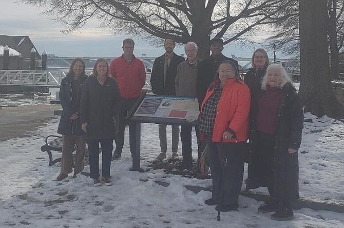 Members of the African American Heritage Trail committee pose for a photo at one of the new historical marks along the waterfront. Shown are Emma Richardson, Eleanor Breen, Ben Skolnik, Blake Wilson, Ted Pulliam, McArthur Myers, Audrey Davis, Krysten Moon and Susan Cohen.