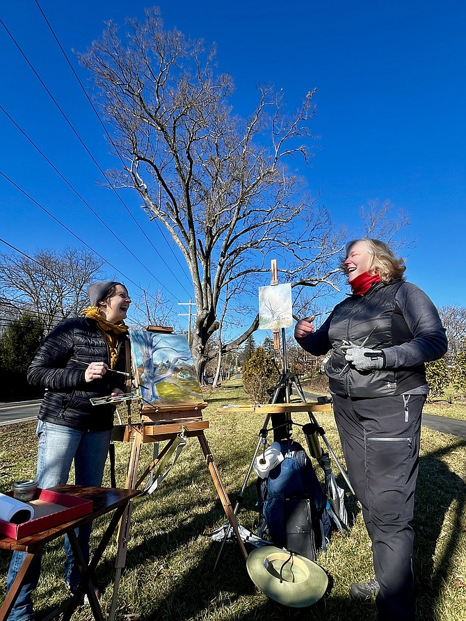 Artists Jenn Griffith and Karen Bateman, members of the Great Falls Studios, capture the final days of doomed Southern Red Oak growing within the summer road of Georgetown Pike.