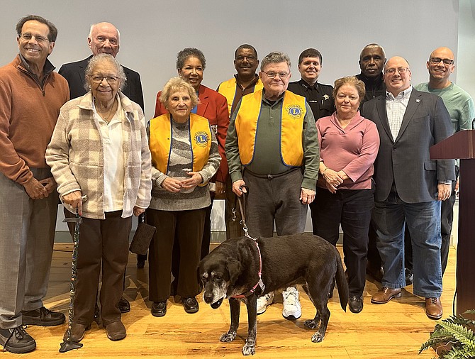 Mayor Justin Wilson, Sheriff Sean Casey and Col. James Paige, back right, pose with members of the Lions Club and CCNA, both sponsor organizations of the James Bland Music Competition, Feb. 4 at The Lyceum.