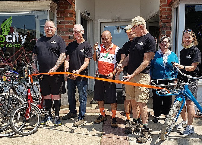The ribbon cutting at Velocity Bike Coop in Arlington, one of many bike-friendly businesses here.