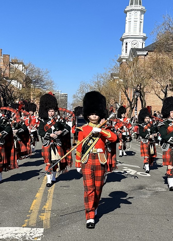 The City of Alexandria Pipes and Drums marches through the streets of Old Town during the 101st annual George Washington Birthday Parade Feb. 19.