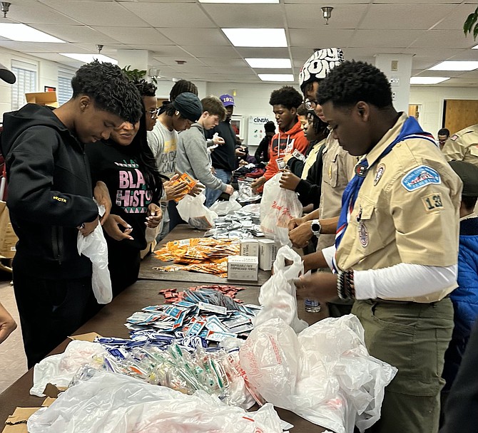 Alfred Street Baptist Church Troop 133 Eagle Scouts gather Feb. 24 to assemble 1,000 cold weather survival kits for distribution at homeless shelters.