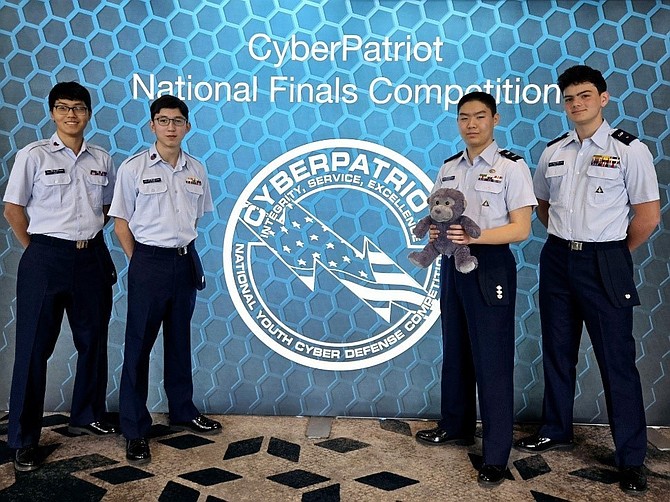 Cadet Senior Airman Gabriel Che, Cadet Senior Master Sergeant Taiyo Lloyd, Cadet Captain Ronald Zhang, and Cadet Second Lieutenant Sully Mills at the CyberPatriot National Competition March 18.