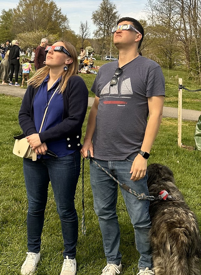 A couple views the solar eclipse April 8 at Ben Brenman Park.