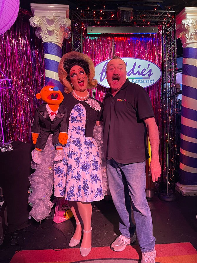 Freddie Lutz, owner of Freddie’s Beach Bar & Restaurant with drag queen Tara Hoot who presented the first drag story hour performance April 6.