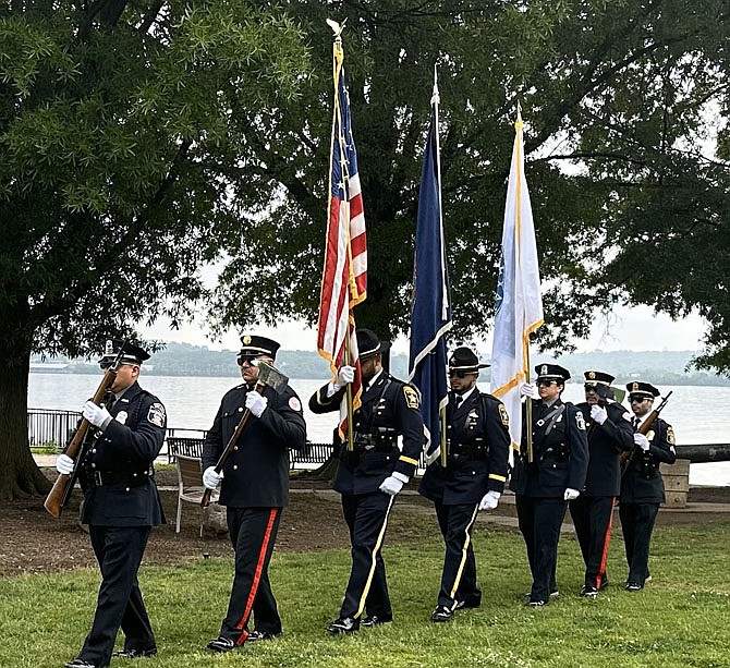 An honor guard of police, fire and sheriff’s office representatives opens the wreath laying ceremony May 7 at Waterfront Park.