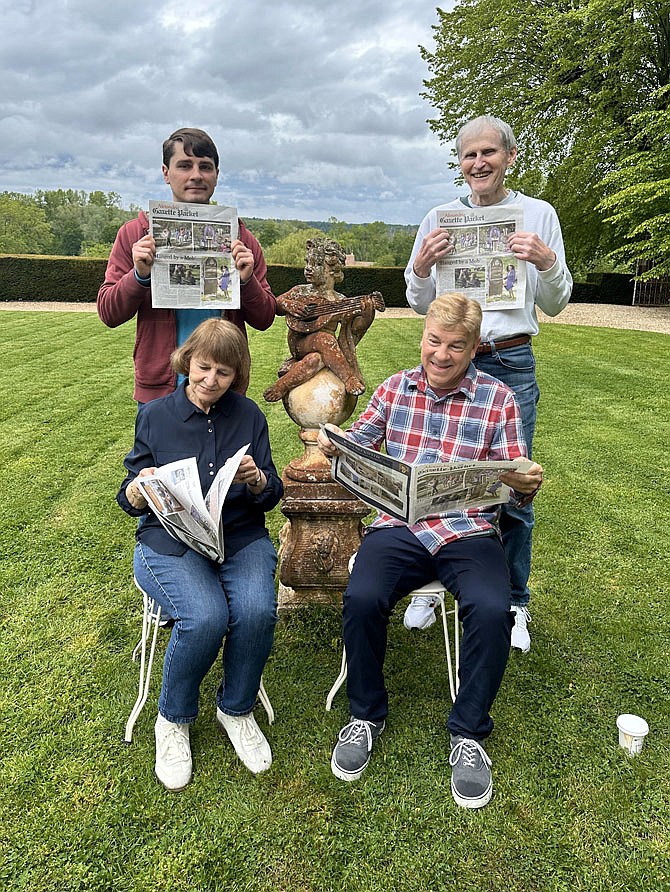 BON ANNIVERSAIRE - Mitch Opalski, seated at right, takes a break from celebrating his 60th birthday at Chateau du Pray in Amboise, France, with his brother Nick Opalski and Alexandrians Jean and Dave Connors as they enjoy the latest copy of the Gazette Packet.