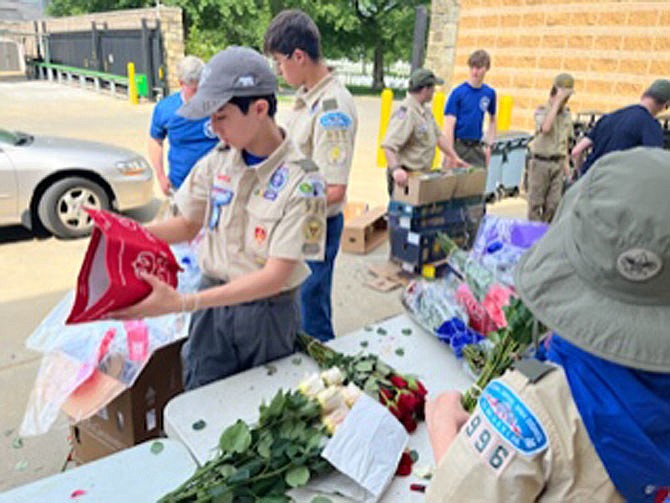 Boy Scout Troop 996 based out of the Methodist church in Fort Hunt, Va., volunteered at the Flowers of Remembrance event.