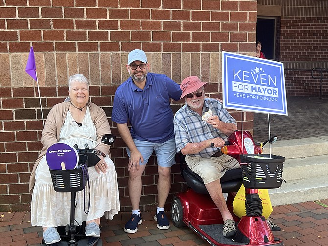 Janice Watson, Town of Herndon candidate for mayor, Keven LeBlanc, and Alex Burke at an FCDC caucus polling place Saturday, Aug. 10.