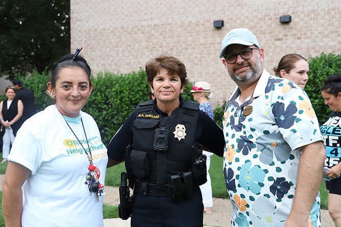 From left) Eva Escobar, Opportunity Neighborhood Ambassador; Chief Maggie DeBoard, Herndon Police Department; and Keven LeBlanc, Herndon Town Councilmember, at National Night Out 2024.