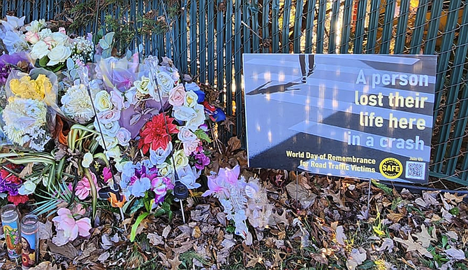 The memorial site of where a driver caused a crash that killed two girls in a 2022 pedestrian crash on Blake Lane, dubbed “Vienna’s racetrack,” according to a petition.