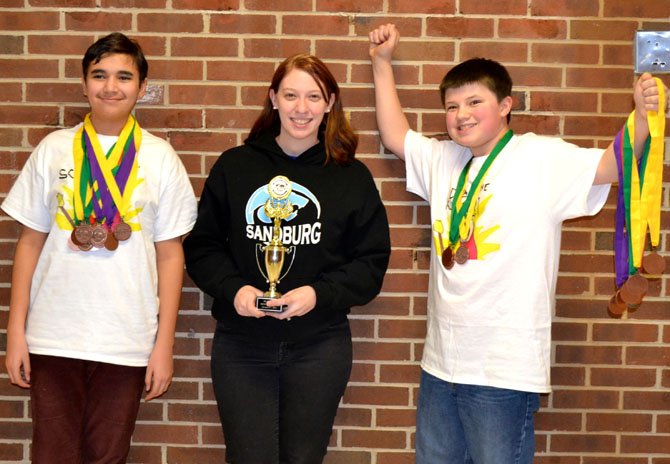Above are 8th grader Brain Trigg (left), 7th grade Life Science teacher Samantha Wilson, and 7th grader Austin Houck.
