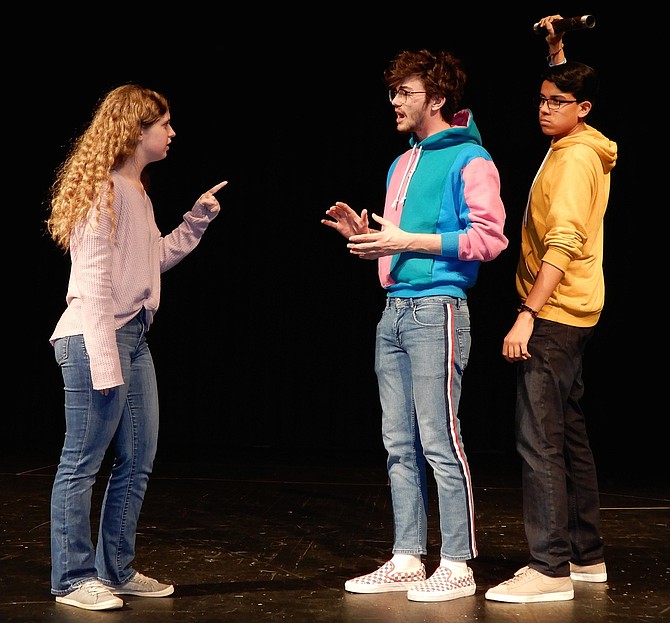 A confrontation during Centreville High’s upcoming play, “Clue.” (From left) are Savannah Lagana (Mrs. Peacock), Ben Stallard (Mr. Boddy) and Michael Crevoisier (Mr. Green).