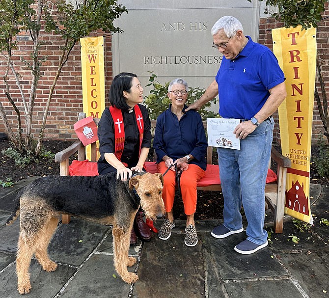 Rev. Grace Han offers a blessing at the annual Blessing of the Animals Sept. 28 at Trinity United Methodist Church.