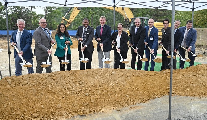 Chairman Jeff McKay and Supervisor Rodney Lusk amongst the crew breaking ground on the new hospital off Beulah Street in the Kingstowne area of Fairfax County.