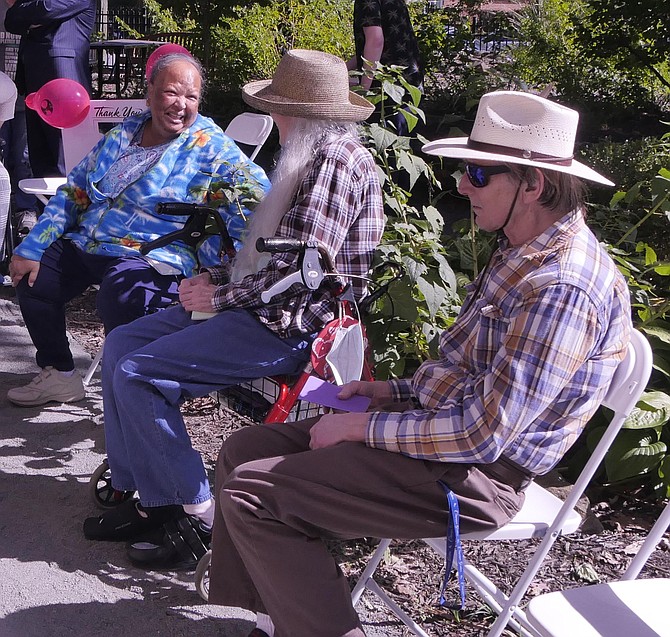 A group gathers at the commemoration of the Culpepper bird garden Friday, October 11.