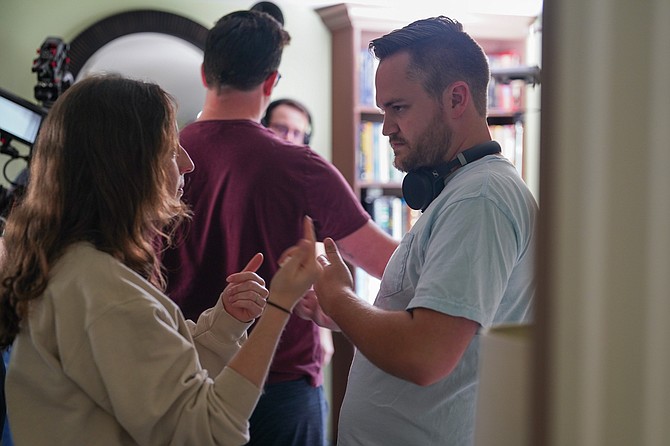 Maggie Gough getting screen advice from producer Ryan Cudahy.