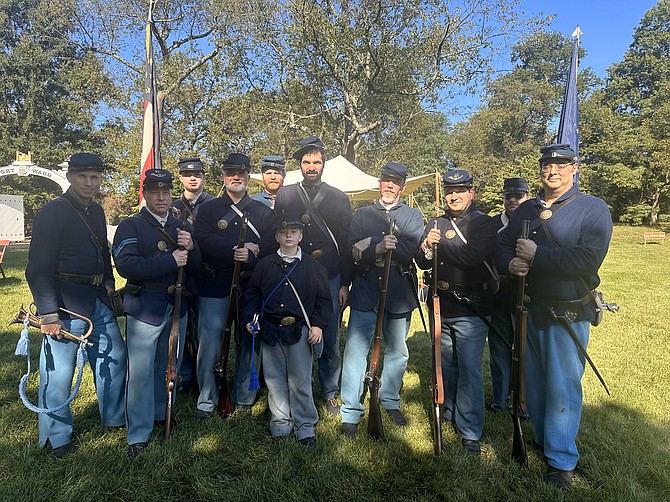 Reenactor troops pose for a photo during Civil War Camp Day Sept. 28 at Fort Ward Museum and Historic Site.