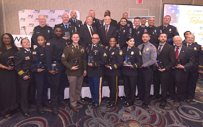 Honorees of the 18th Annual Police & Firefighters Tribute gather for a group photo, celebrating the bravery, dedication, and service of Fairfax County's first responders and public safety professionals. The event, hosted by the Mount Vernon Springfield Chamber of Commerce, recognized exceptional achievements across law enforcement, firefighting, and emergency medical services."