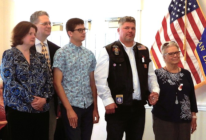 From left are Karen and John Mason Jr., Charles Mason and dad Jeff, and Jeanette Mason.