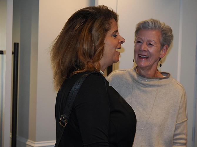 Guest Felicia Meyer-DeLoath, left, with Nancy Hawkins, Fashion Show Co-chair.