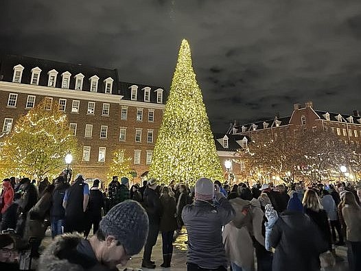 A crowd of hundreds watch as a 40-foot tree is lit with 40,000 lights at the annual holiday tree lighting ceremony Nov. 18 at Market Square.