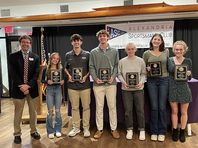 Alexandria Sportsman’s Club president Ryan Fannon, left, poses for a photo with the November Athletes of the Month Nov. 20 at the Old Dominion Boat Club. Pictured from left: ASC president Ryan Fannon; Cate Messing, Bishop Ireton High School -- Girls Cross Country; Garrett Lian, St. Stephen's & St. Agnes School -- Boys Soccer; Nick Milewski, Bishop Ireton High School -- Football; Addie Youree, St. Stephen's & St. Agnes School -- Field Hockey; Kalina Janevski, Alexandria City High School -- Volleyball; and Virginia Coulby, Alexandria City High School -- Girls Cross Country.