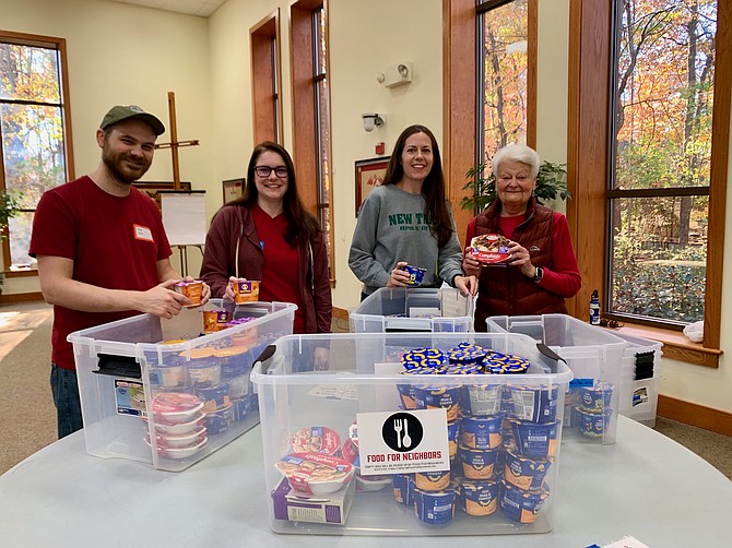 Liz Kamp (2nd from right), Founder of New Trail Cycling & Strength, inspires others in service at Good Shepherd Lutheran Church in Herndon.