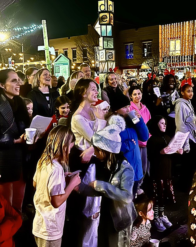 The crowd awaits the lighting of the Del Ray Christmas tree Dec. 8 at Pat Miller Neighborhood Square.