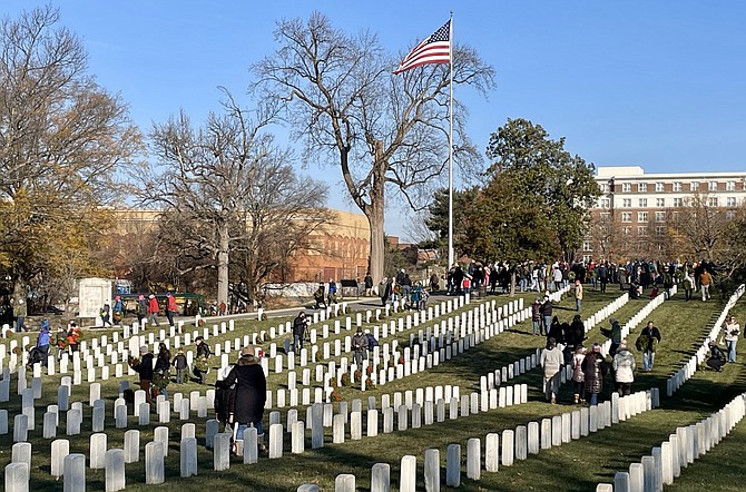 Volunteers spread out across the Alexandria National Cemetery to place more than 4,000 wreaths honoring veterans as part of Wreaths Across America Dec. 14.