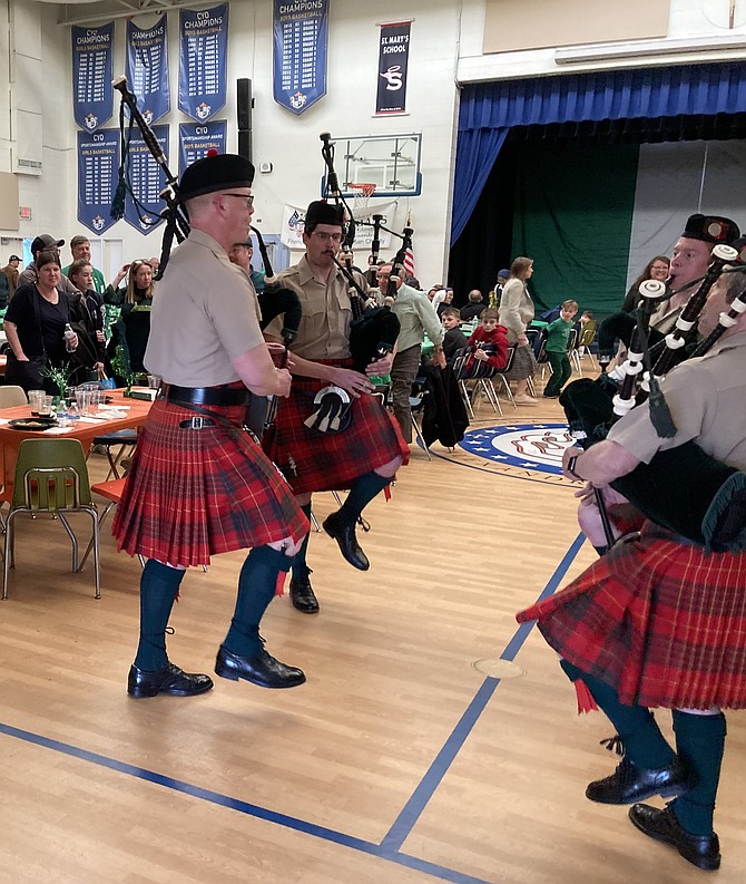 Members of the City of Alexandria Pipes and Drums perform at the Irish Hooley March 9 at the Basilica School of St. Mary gymnasium.