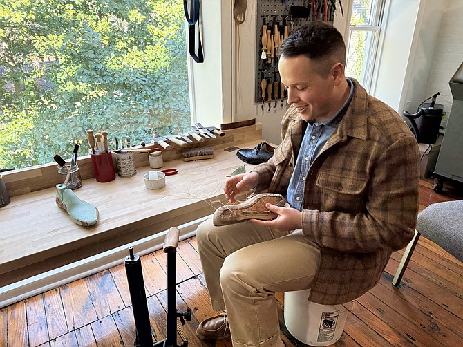 Custom shoe craftsman Drew Altizer in his workshop at Old House Provisions, a fine menswear boutique on Cameron Street in Old Town.