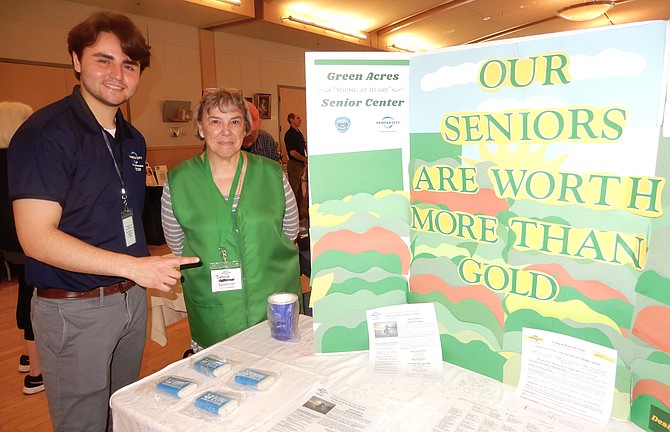 Green Acres Senior Center staffer Daniel Novoa and volunteer Debra Sparkman promote the center’s trips, game room, fitness center and membership opportunities.