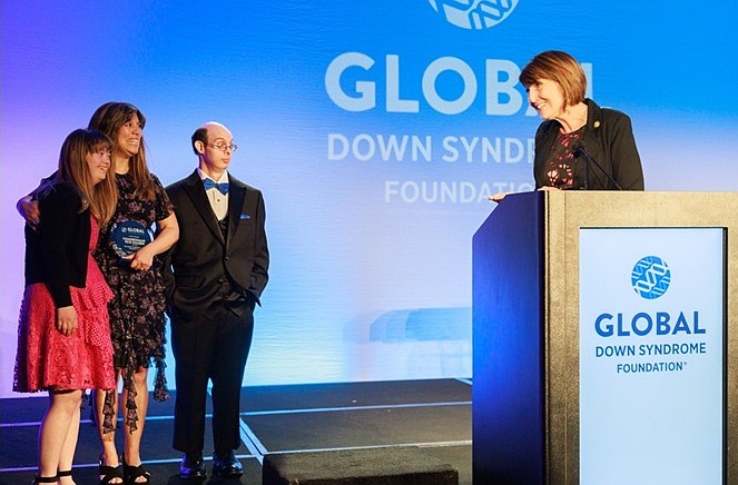 David Egan stands beside Michelle Sie Whitten, the CEO of GLOBAL, and her daughter, as Republican U.S. Rep. Cathy McMorris Rodgers (WA-5) addresses them at the 2023 AcceptAbility Gala. Rogers served in office from Jan. 3, 2005, to Jan.3, 2025.