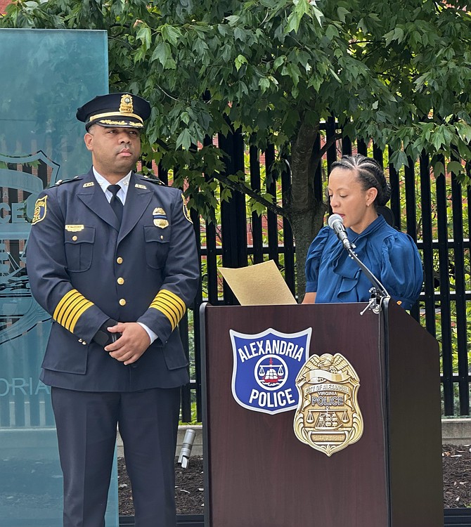 A bell is rung as part of the End of Watch roll call at the Fallen Officers Memorial wreath laying May 7 at APD headquarters.