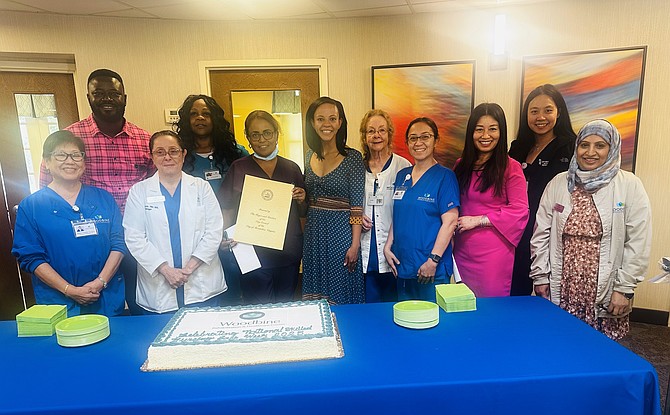 Mayor Alyia Gaskins, center, presents a proclamation to the nurses at Woodbine Health and Rehabilitation Center May 15 in recognition of National Nurses Week, which ran from May 6-12.