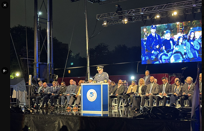 Chief Kevin Davis of the Fairfax County Police Department reads a section of the Roll Call during the National Law Enforcement Memorial and Museum Fund’s 37th Annual Candlelight Vigil held on the National Mall in Washington, D.C.