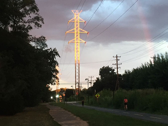 A Dominion Energy transmission tower in the right-of-way of the W&OD Trail in the Town of Herndon