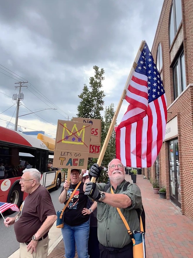 People of all ages participated in “No Kings Day" in the Town of Herndon. The phrase “Let’s Go TACO”  is an acronym that means "Trump Always Chickens Out.” Wall Street workers coined it for Trump’s on-and-off approach to tariffs.