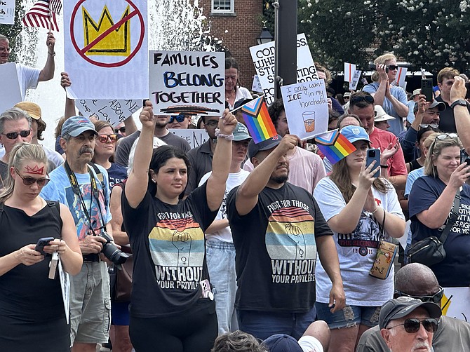 Hundreds turned out holding signs during the No Kings rally June 14 in Market Square.
