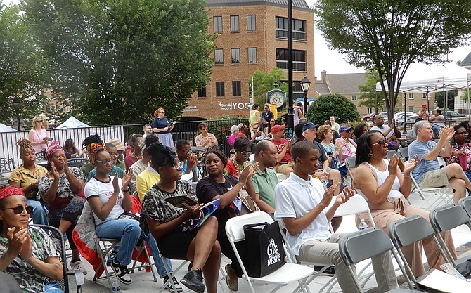 A section of the attendees applauding one of the speakers.