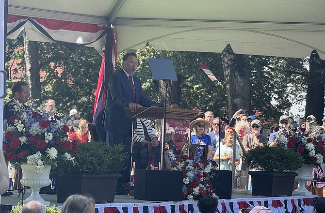 Former California Governor Arnold Schwarzenegger delivers remarks at the July 4 U.S. naturalization Ceremony at Mount Vernon Estate.