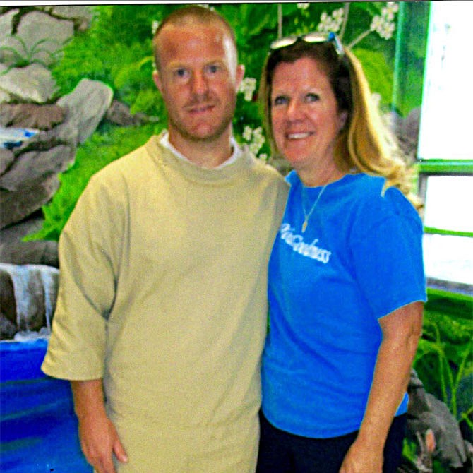 Justin Wolfe and mom Terri Steinberg during a July 2017 prison visit.