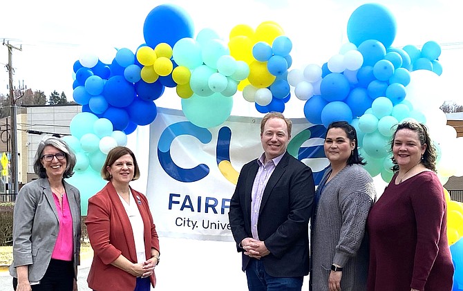 Chris Bruno (center) celebrates a CUE bus event with (from left) Transportation Director Wendy Sanford, Mayor Catherine Read, FCED’s Tara Borwey and Central Fairfax Chamber of Commerce Director Jennifer Rose.