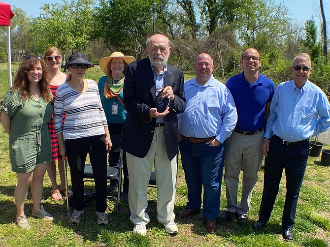 Jack Sullivan, center, receives the 2022 Ellen Pickering Environmental Excellence Award. Sullivan died Aug. 16 at the age of 90.